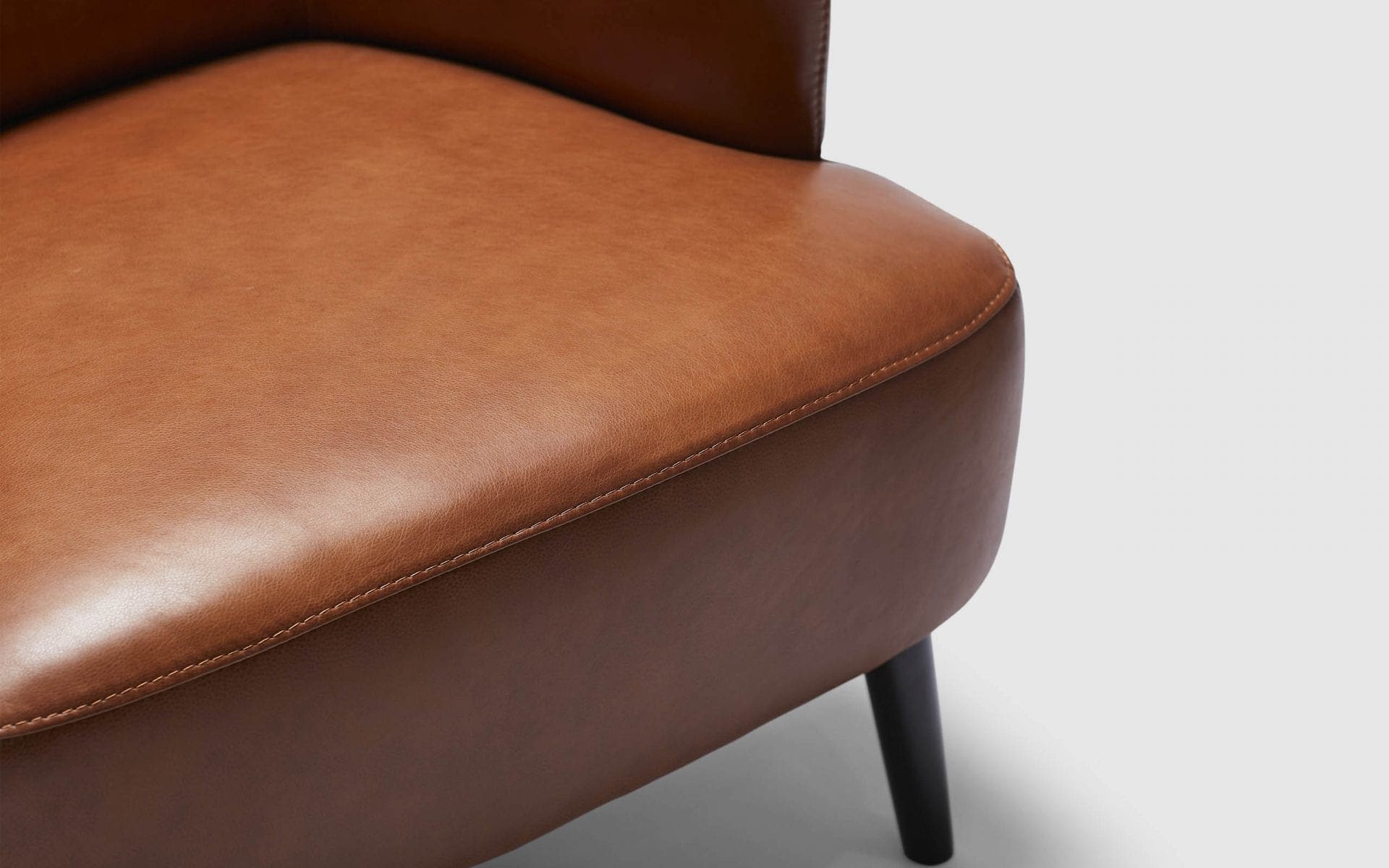 brown accent chair with ottoman